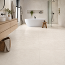 Vloertegel betonlook Concrete Desert 100 x 100 cm - badkamer met douche en vrijstaand bad op betonlook vloer in beige